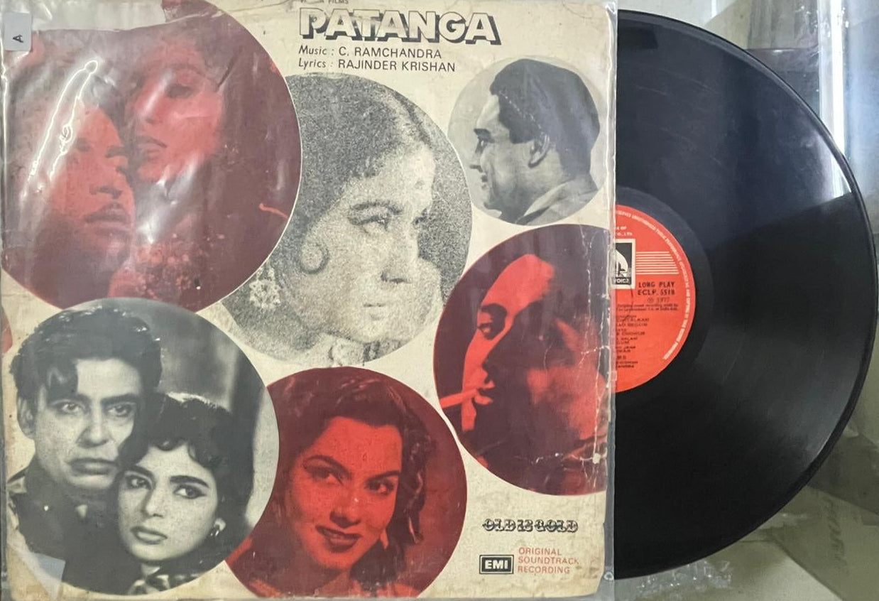 Vinyl record with a colorful cover featuring faces and text.