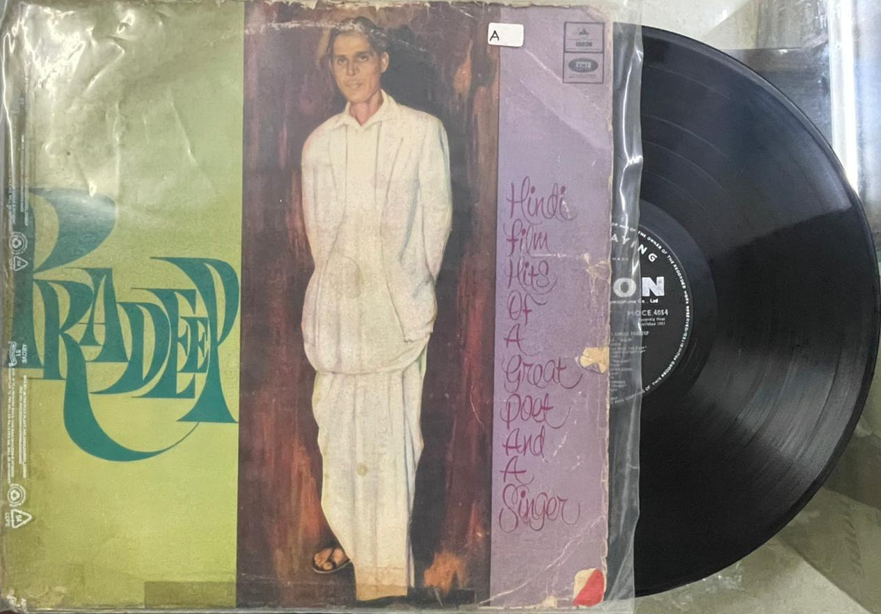 Vinyl record with a colorful cover featuring artistic design and text.