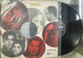 Vinyl record with a collage of faces on the cover
