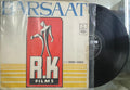 Vinyl record with a red and yellow cover featuring the text 'R.K. Films' and 'Warsaw'.