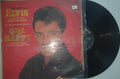 Vinyl record with a red cover featuring a person's face and text.