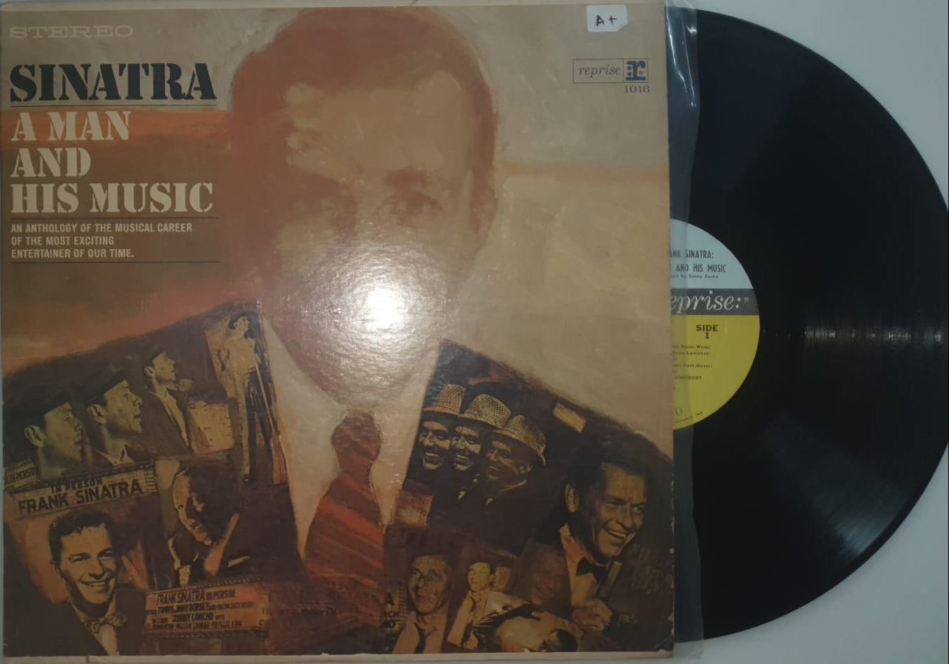 Vinyl record with cover featuring a portrait and text on a white background
